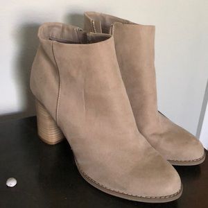 Tan healed boots.